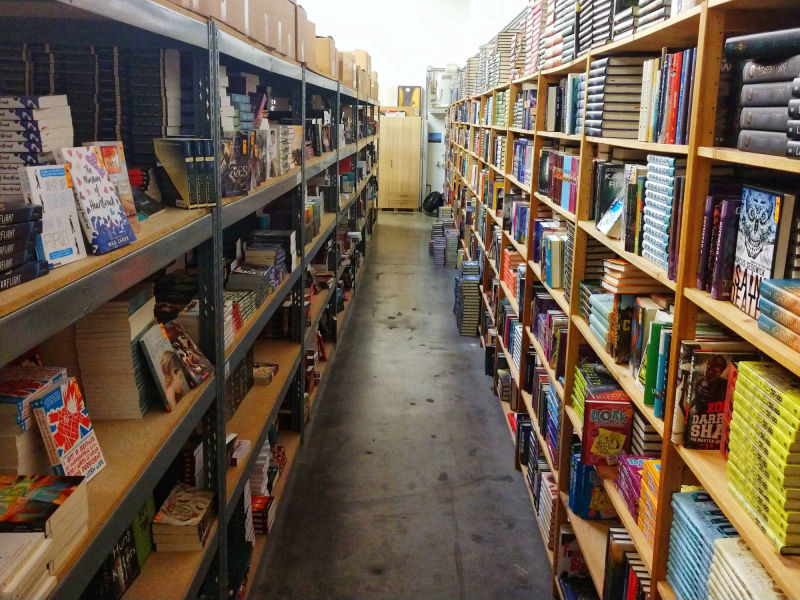 long double sided row of bookshelves